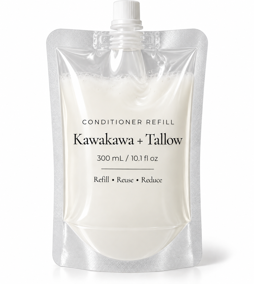 A 300 mL refill pouch of Kawakawa + Tallow conditioner, filled with a milky off-white liquid, on a clean white background.