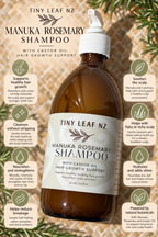 A bottle of Tiny Leaf Nz Manuka Rosemary Shampoo with castor oil hair growth support, set against a background of dried botanicals. The amber glass bottle has a white pump and a cream-colored label.