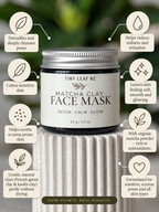 A jar of Tiny Leaf NZ Matcha Clay Face Mask centered on a reflective silver surface, surrounded by circular callout graphics with product benefits on a blurred green outdoor background.