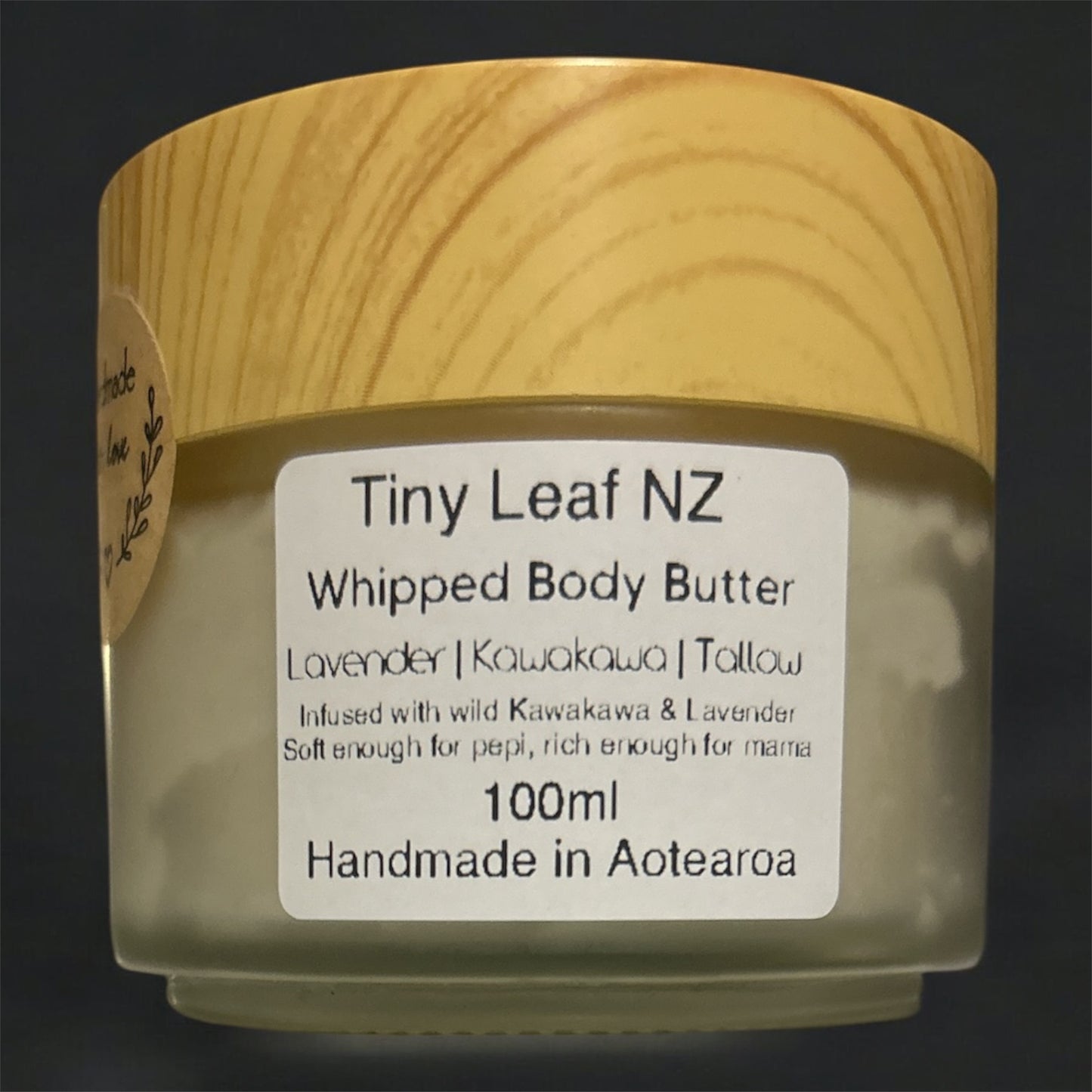 Whipped Tallow Body Butter 100ml in a clear glass Jar with a light brown wood lid